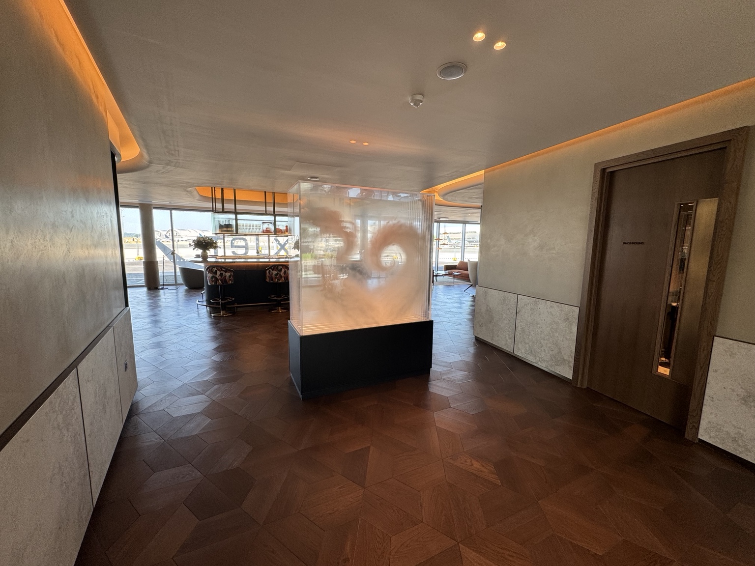 Flexjet terminal interior with warm architectural lighting