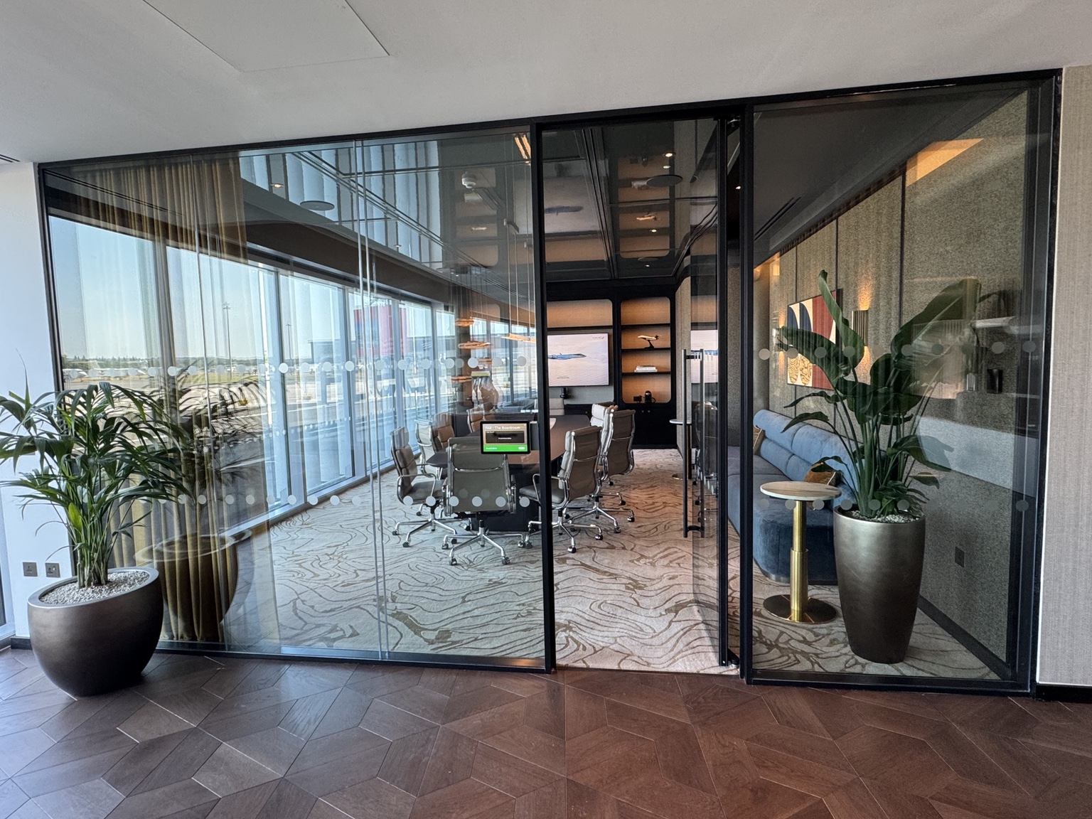 Glass-fronted meeting room within the Flexjet facility